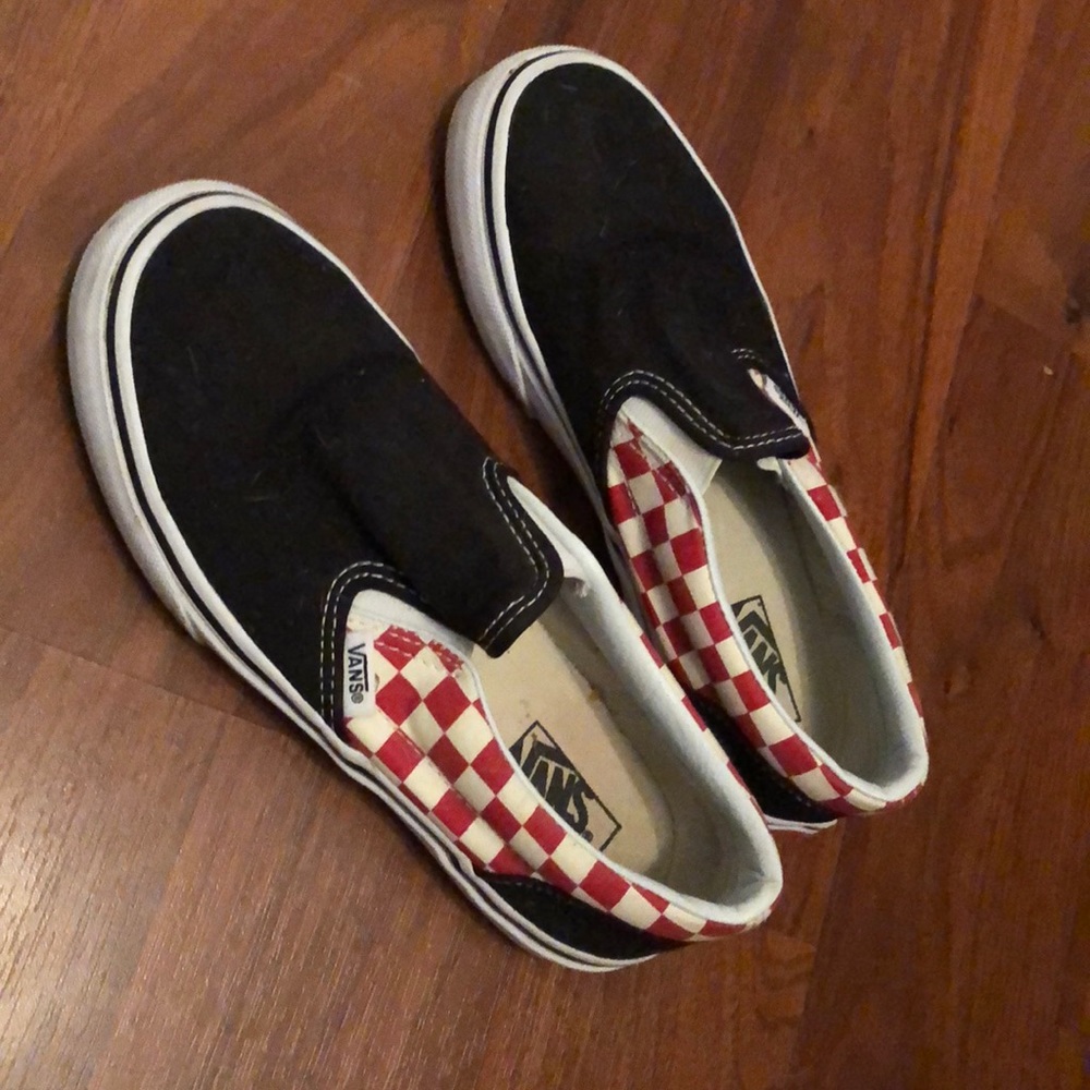 Black and red checkered slip on vans